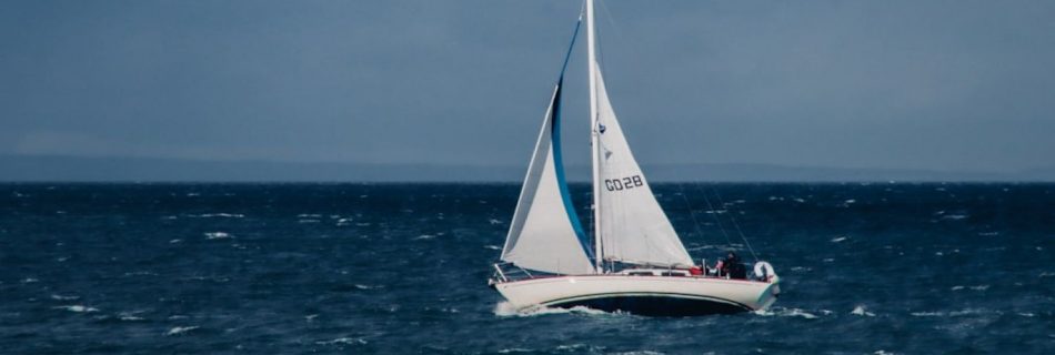 Sailing Trip - a sailboat in the middle of the ocean