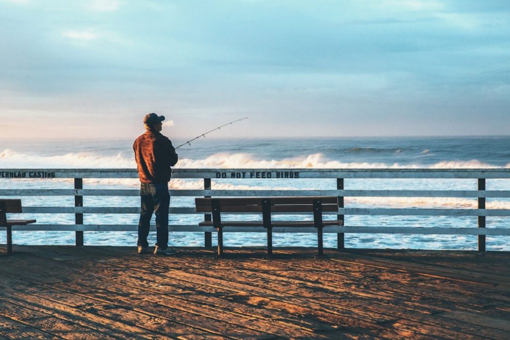 Fishing - man fishing on seaside