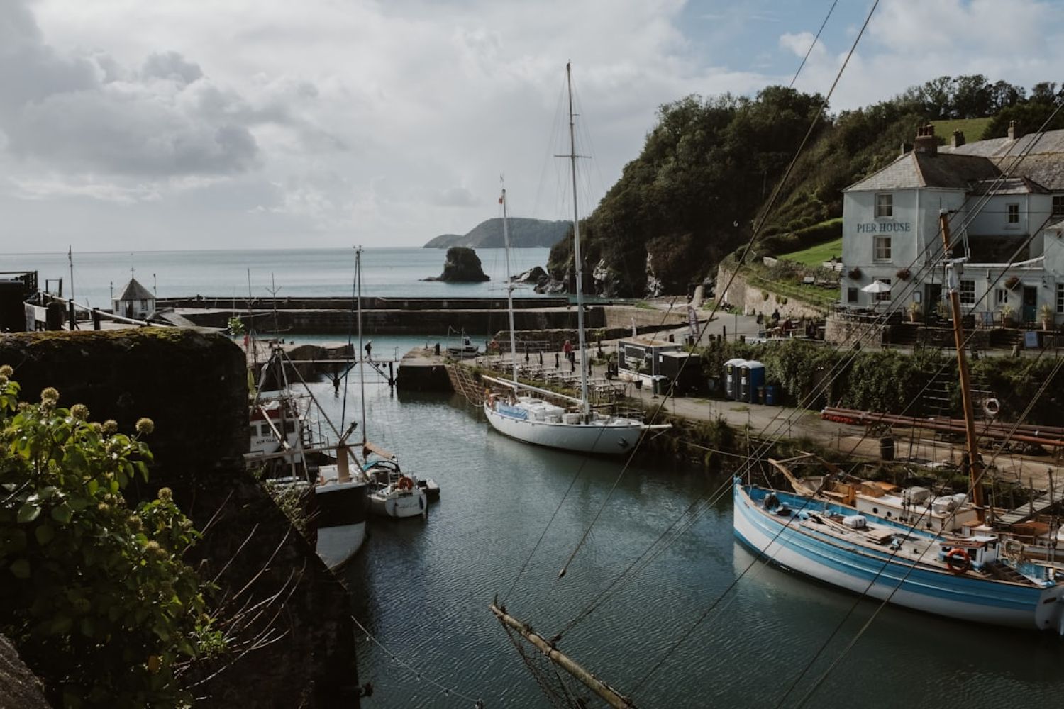 Boat Cornwall - a group of boats that are sitting in the water