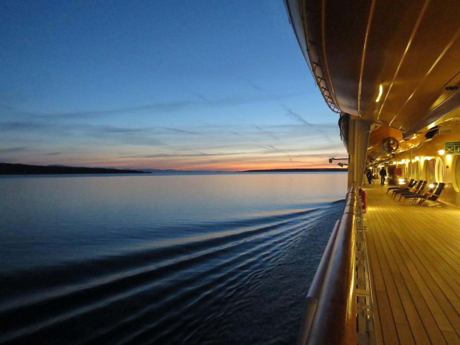 Sunset Cruises - passenger view of cruiser ship on sea