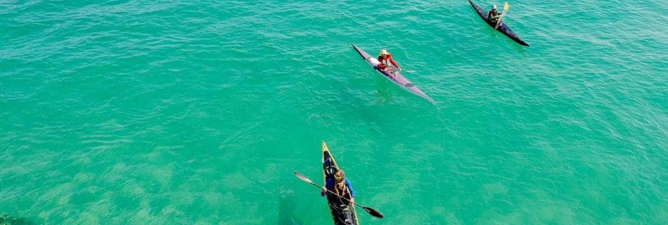 Kayaking - Three Yellow and Pink Kayak